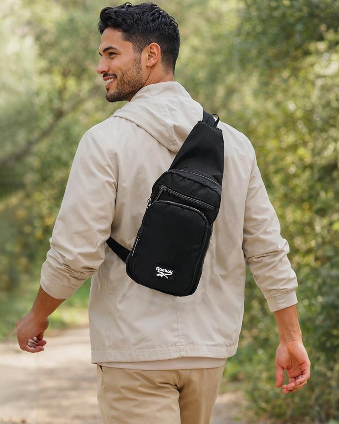 Reebok Unisex Crossbody Bag - Convertible Compact Durable Cross Body Bag for Women and Men - Gym and Travel Essentials, Size One Size, Cosmos Black With White Logo
